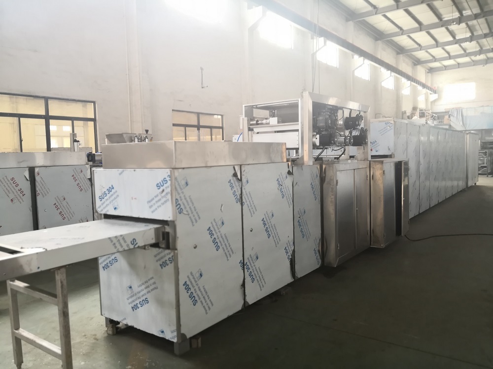 नवीनतम कंपनी ब्लॉग के बारे में चॉकलेट डिपोजिटिंग लाइन चयन गाइड – उत्पाद डिज़ाइन से तापमान नियंत्रण तक